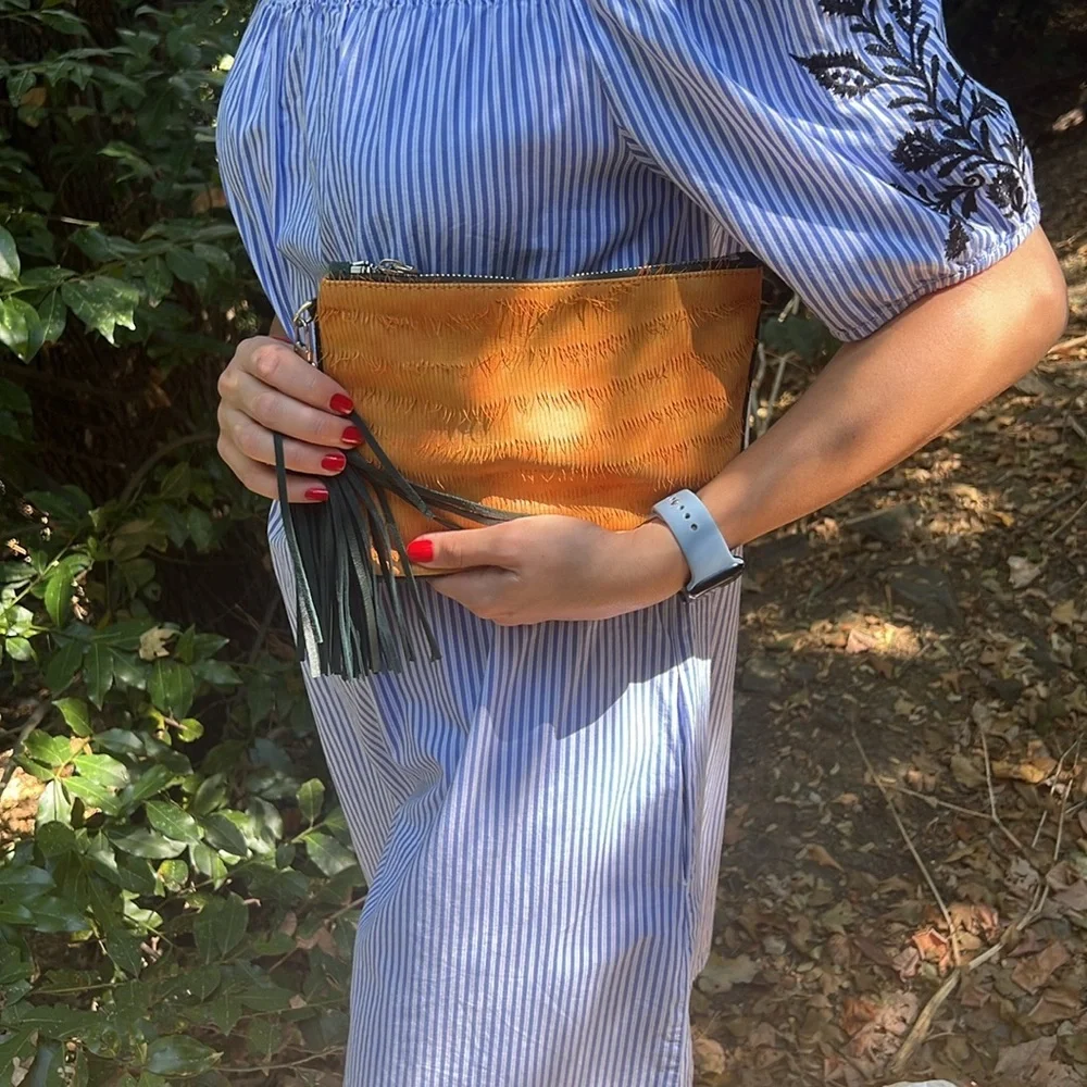 Orange suede green leather pouch